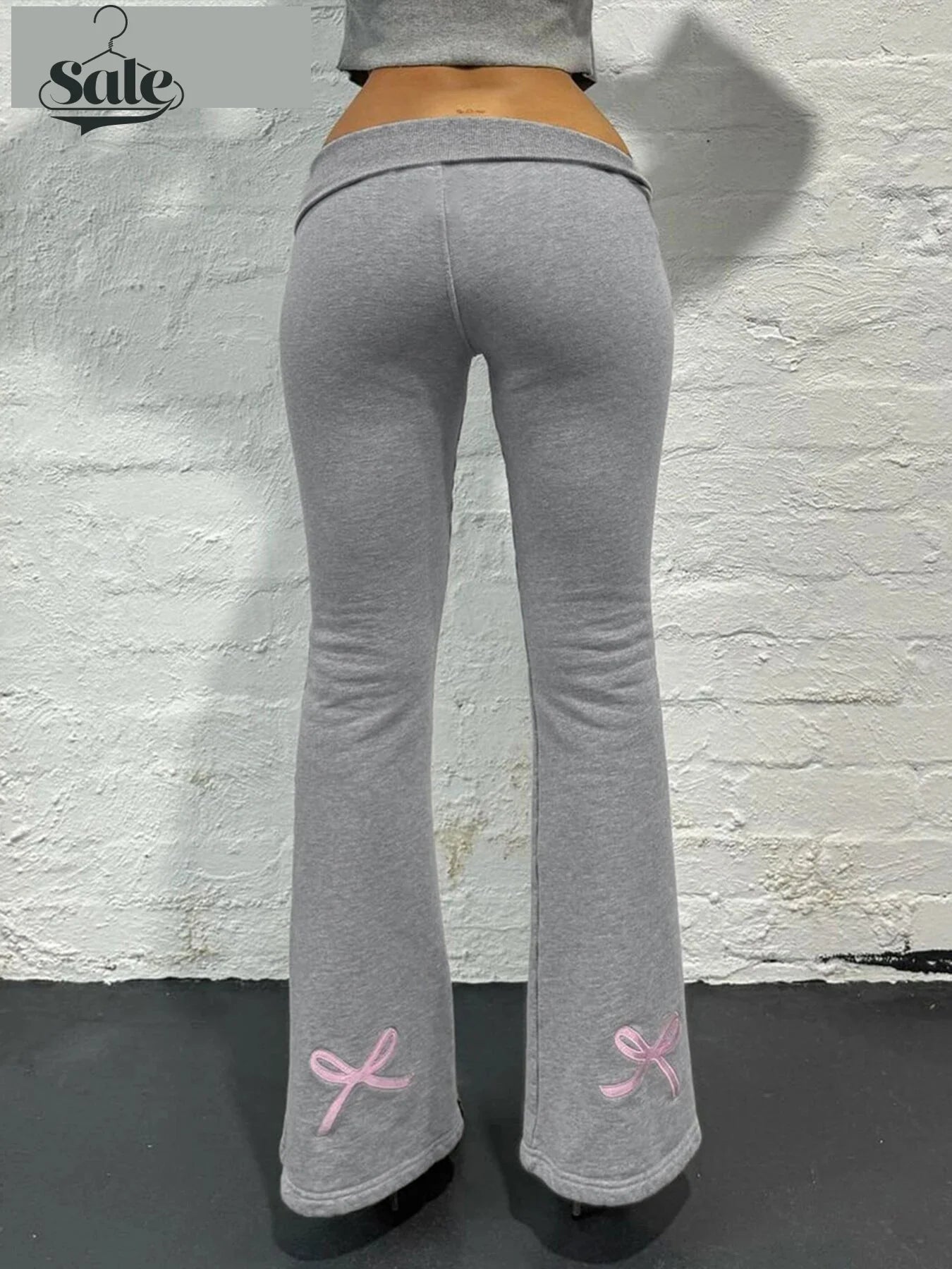 Gray Flared Leggings with Pink Ribbon Detail	