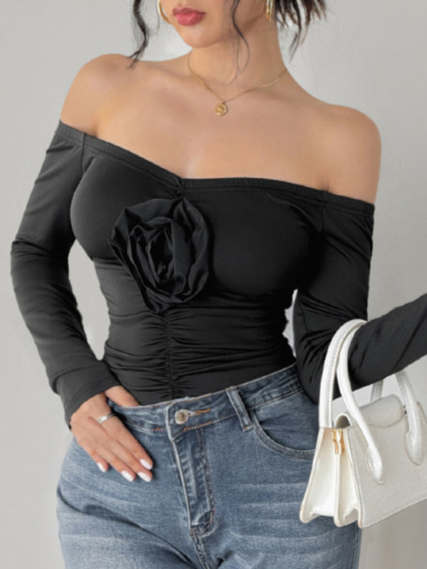 Modern Black Off-Shoulder Bodysuit with Floral Applique Detail	