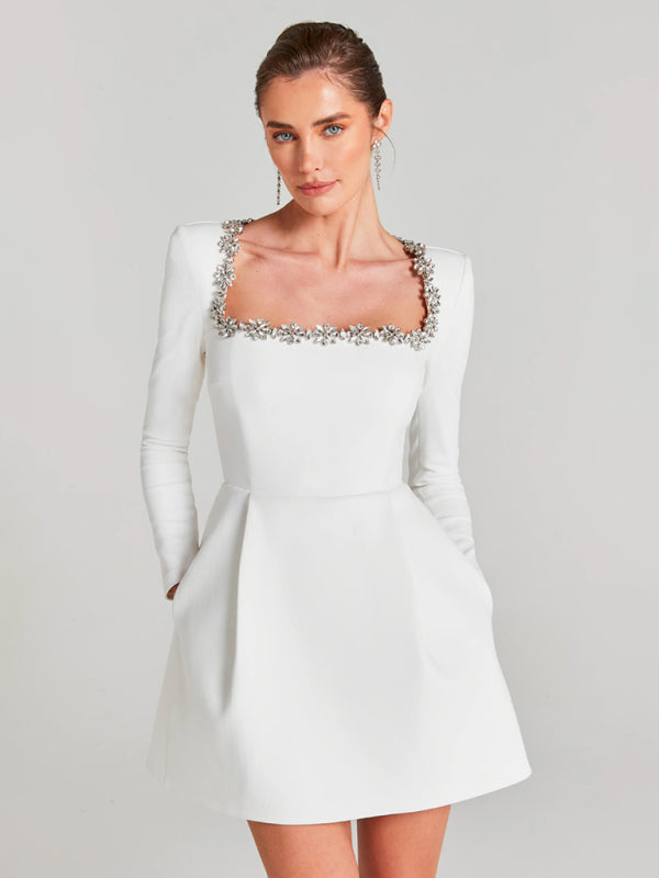 Sophisticated White A-Line Dress with Ornate Neckline	