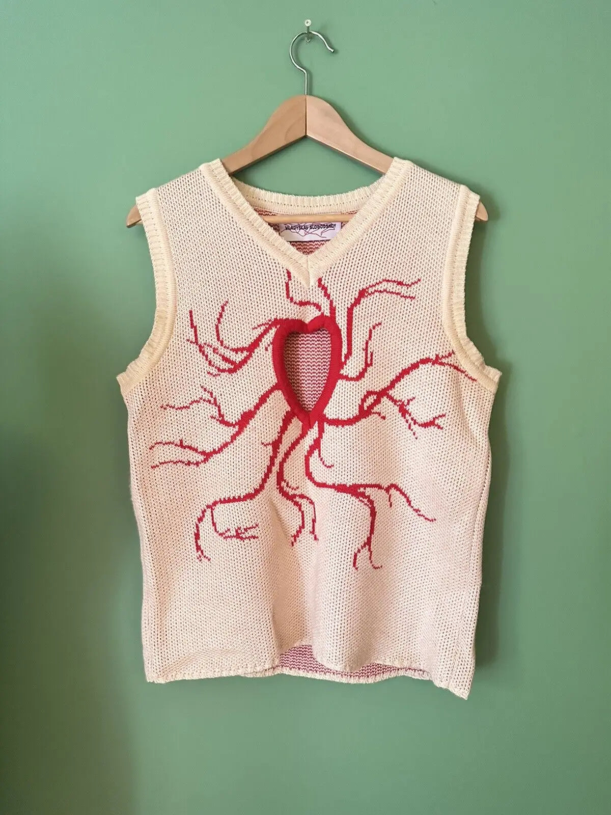 Casual Knit Top with Unique Heart Embroidery	