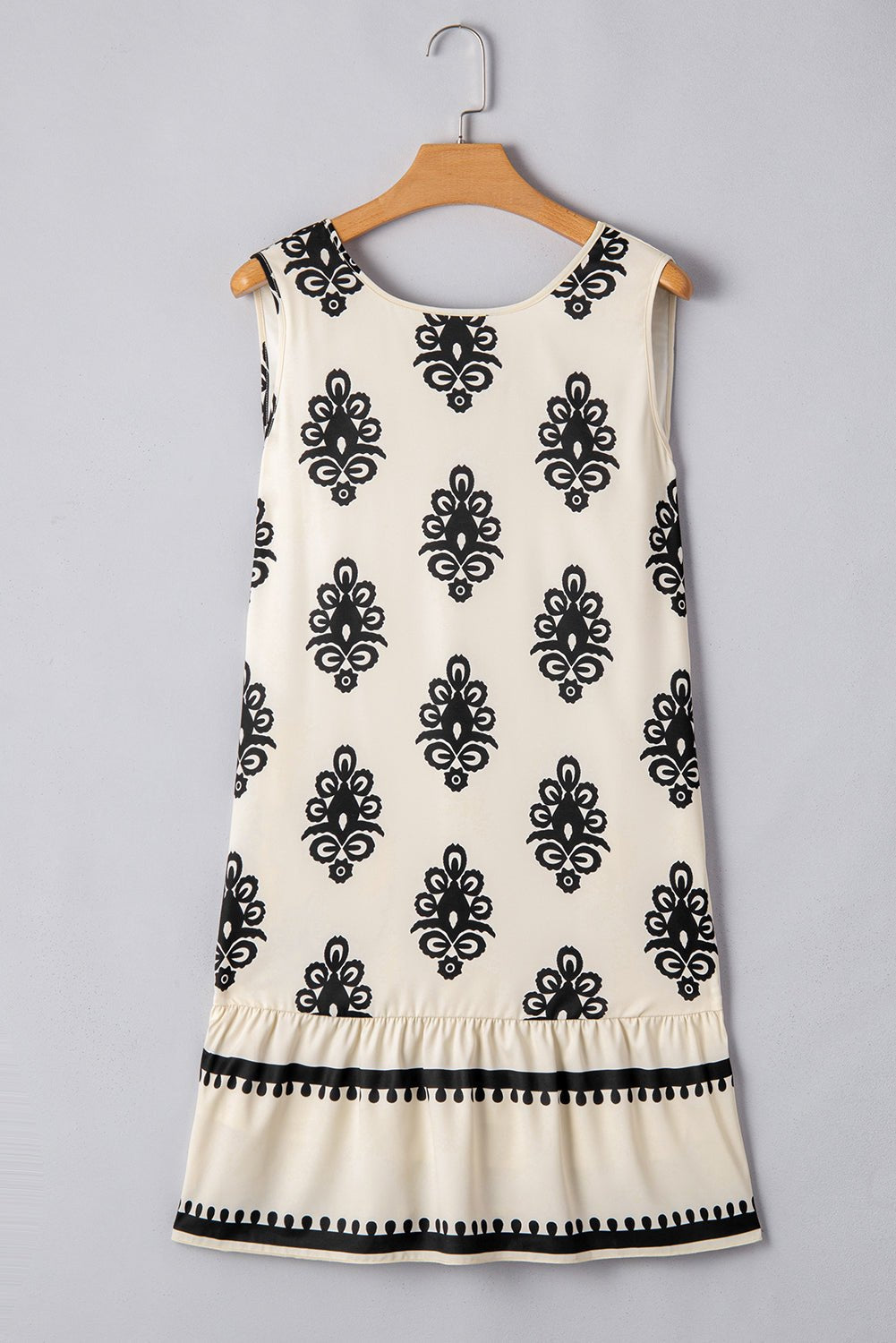 Sleeveless Summer Dress with Ruffled Hem and Open Back Mini