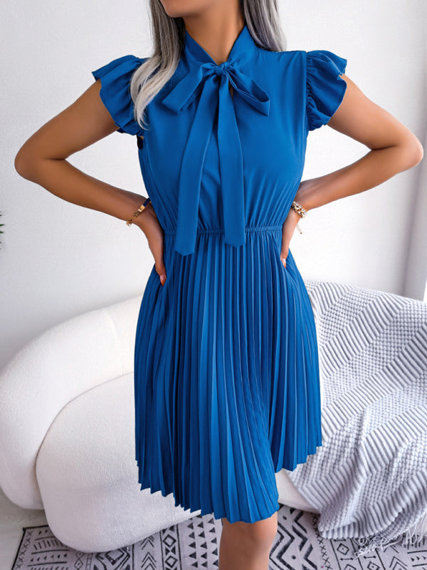 Experience the Comfort and Style of our Pleated Mini Dress -