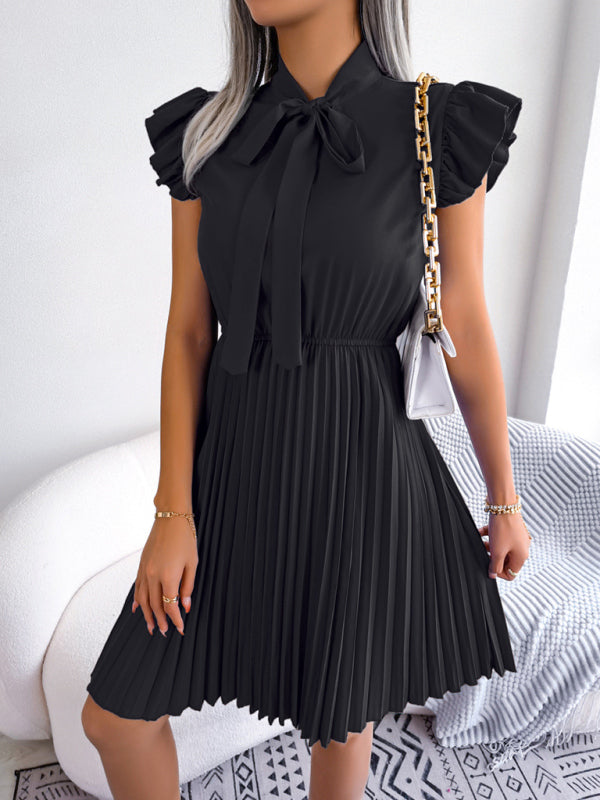 Experience the Comfort and Style of our Pleated Mini Dress -