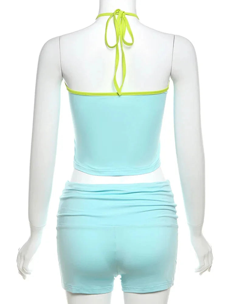 Vibrant Neon Halter and Shorts Set for the Active Woman Summer