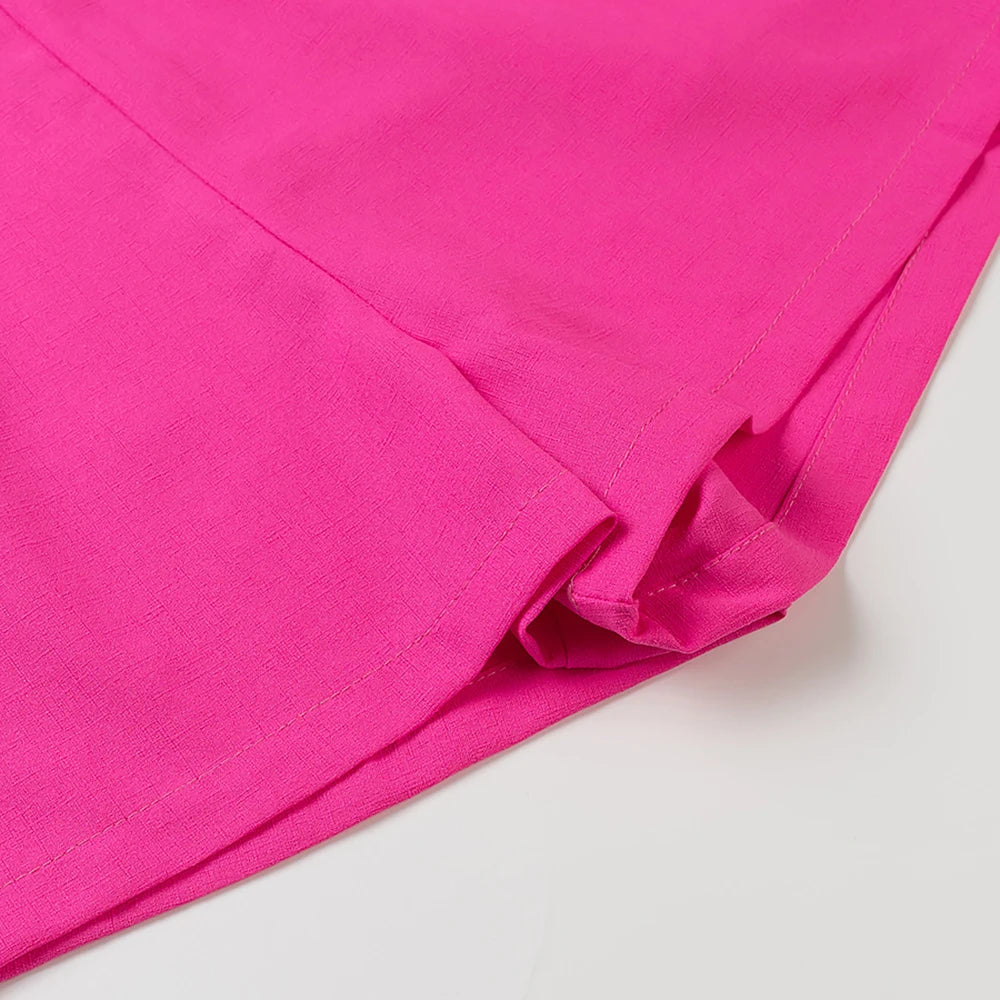 Structured Hot Pink Playsuit with Bow Back for Summer Events | Rompers
