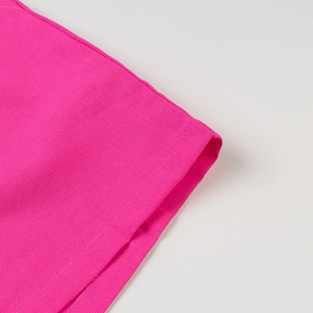 Structured Hot Pink Playsuit with Bow Back for Summer Events | Rompers