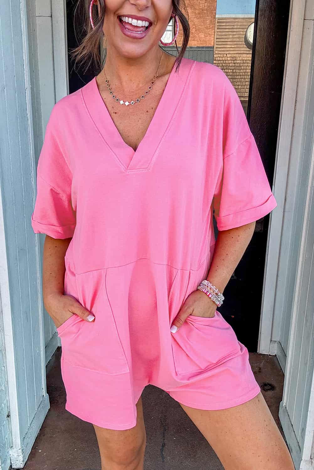 Casual Pink Knit Romper with V-Neck and Rolled Sleeves | Jumpsuits & Rompers