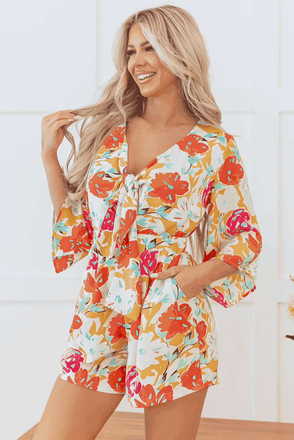 Colorful Vacation Romper with Bow Front and Flowy Sleeves | Jumpsuits & Rompers
